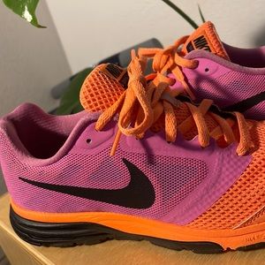 Purple and orange running Nike woman’s shoe size 8